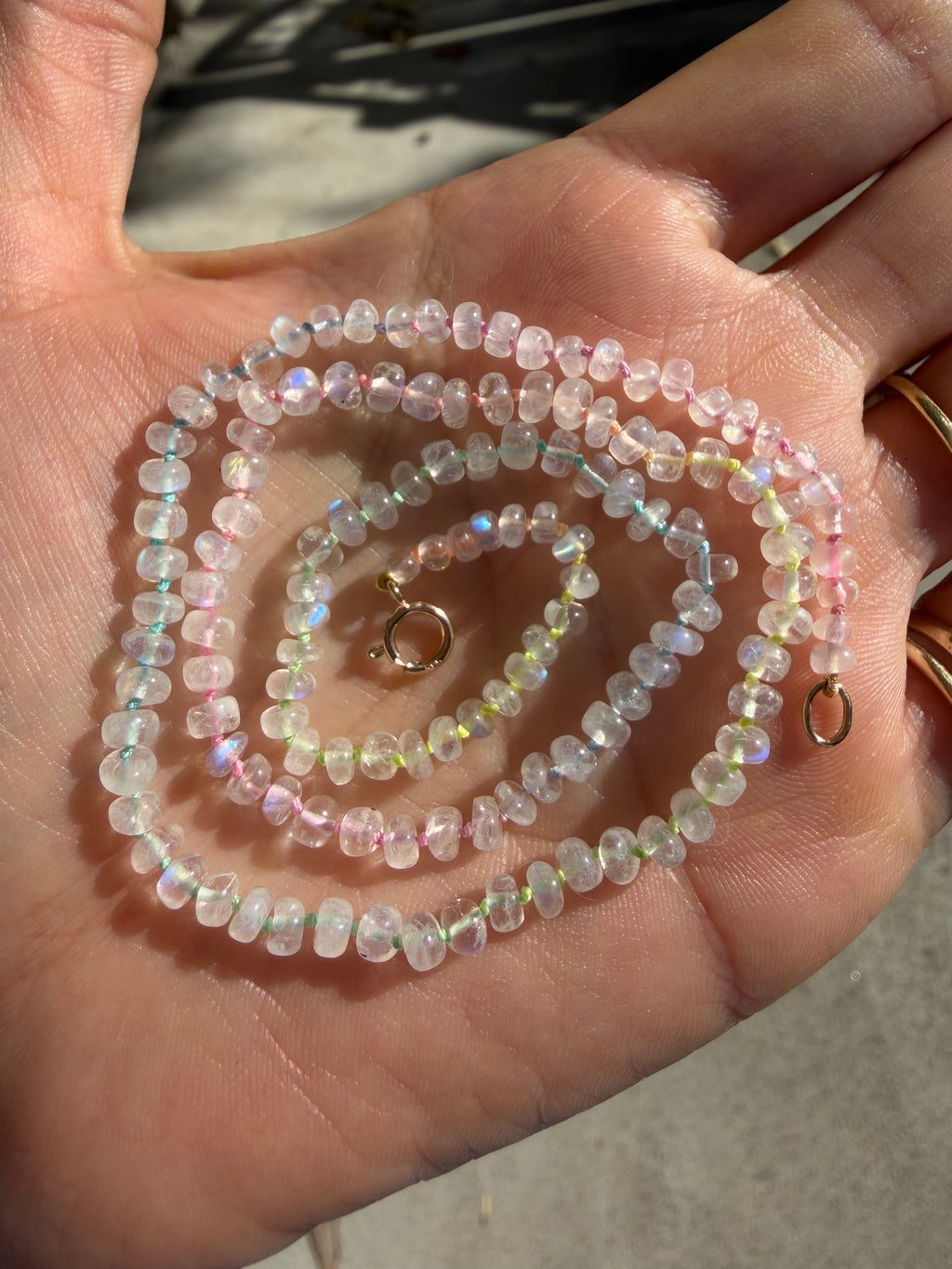 Moonstone on Tie Dye Silk (hand-knotted)